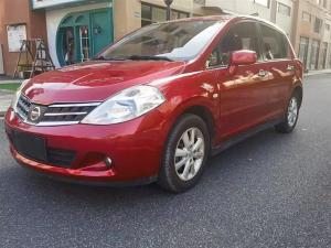 Nissan  Tiida 2010 Бензин